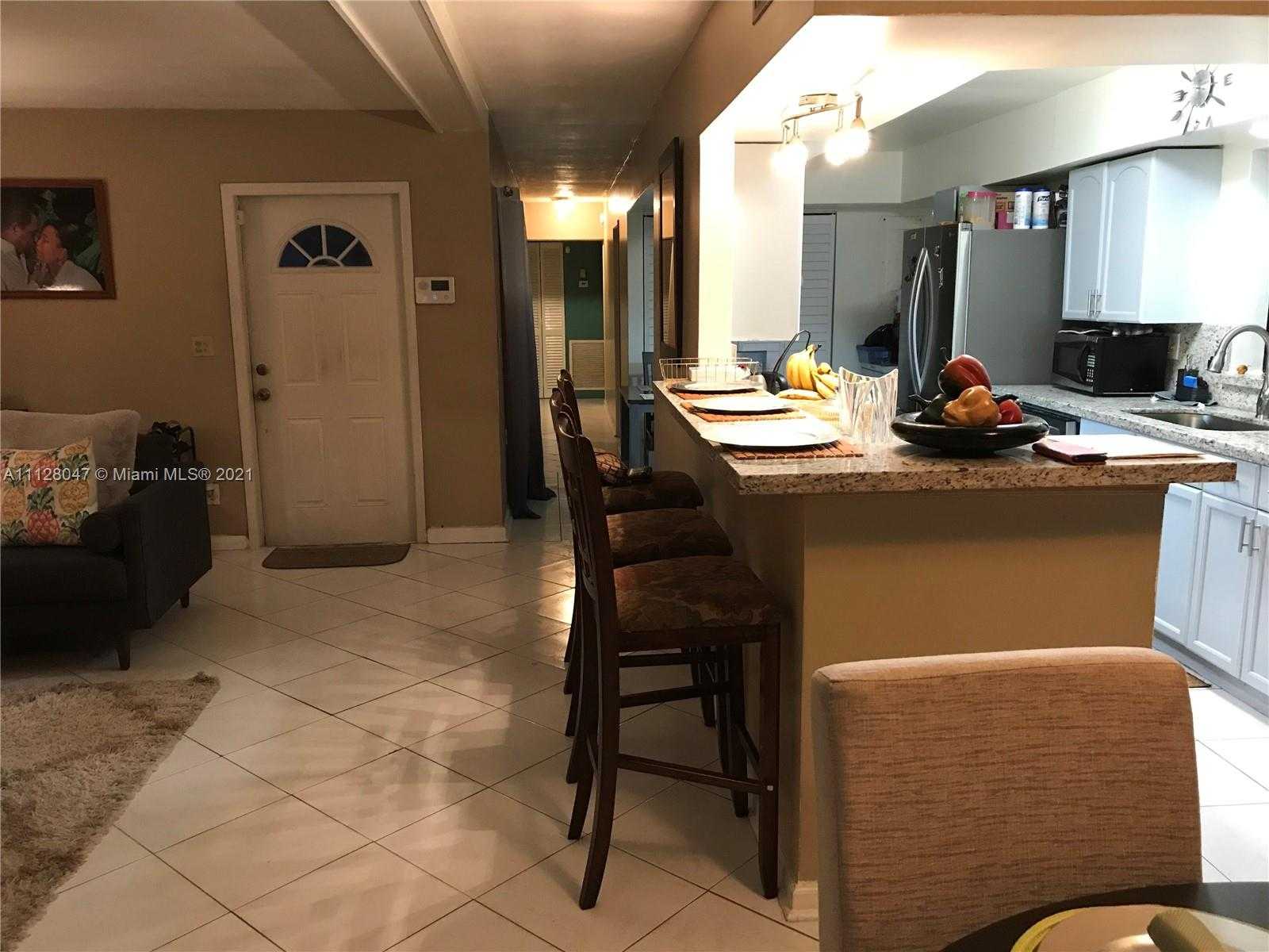 Small Image of 6702 NW 71st Ave, Tamarac, FL 33321, USA Number 3