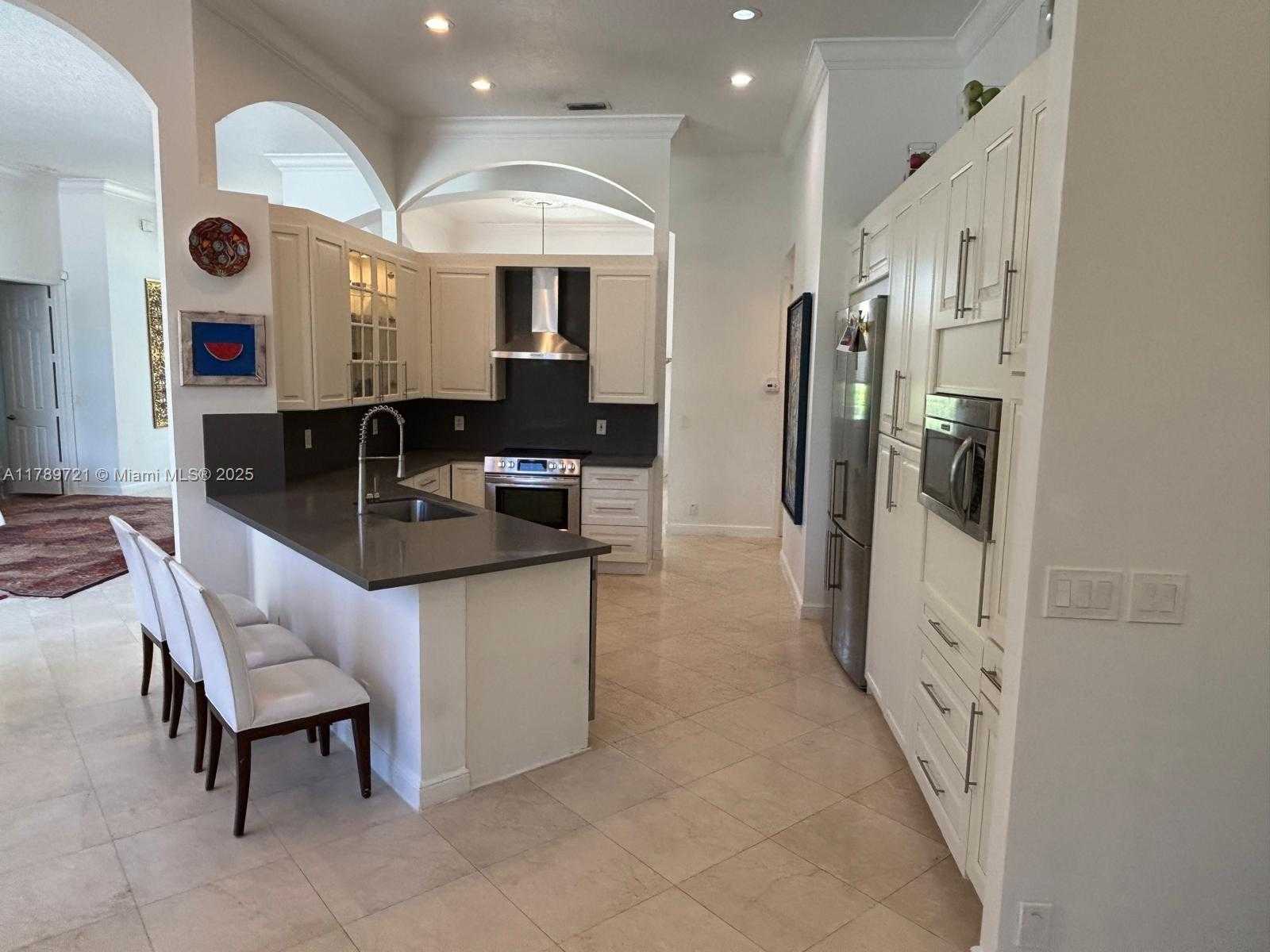 Small Image of 320 WINDMILL PALM AVE, Plantation Number 12