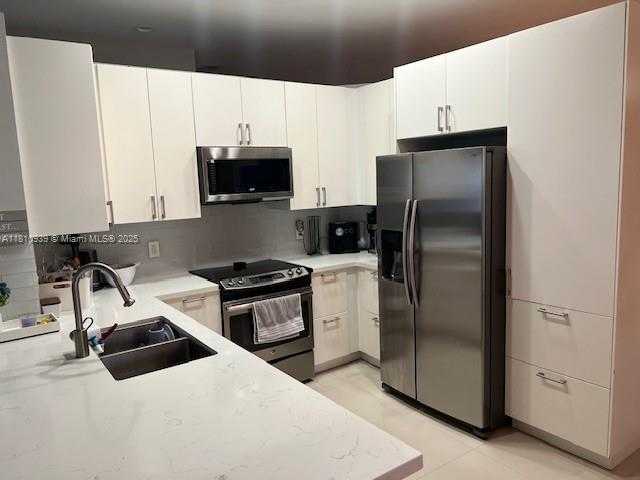 Small Image of 1020 SILKTREE LN, Weston Number 3