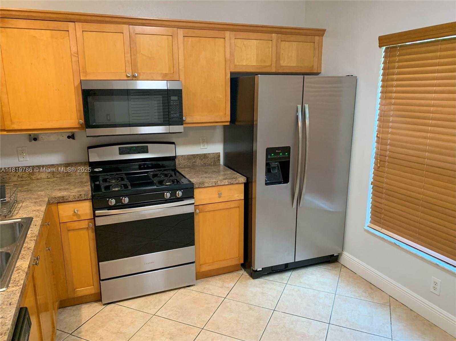 Small Image of 10911 JEWEL BOX LN, Tamarac Number 2