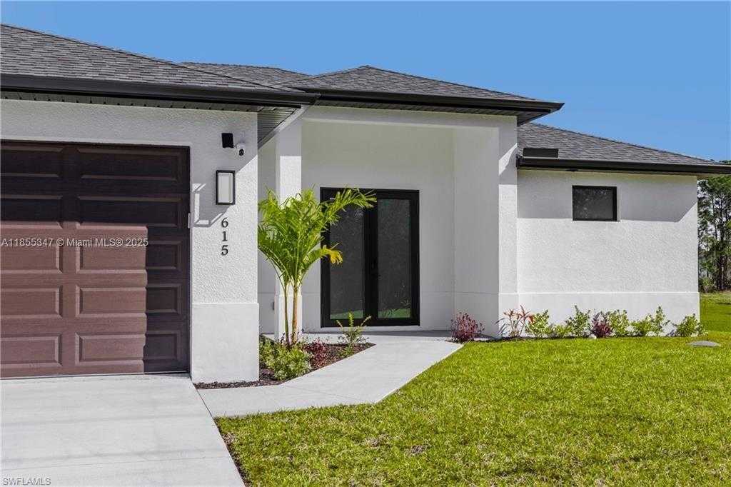 Small Image of 615 Addison St E, Lehigh Acres, FL 33974, USA Number 2