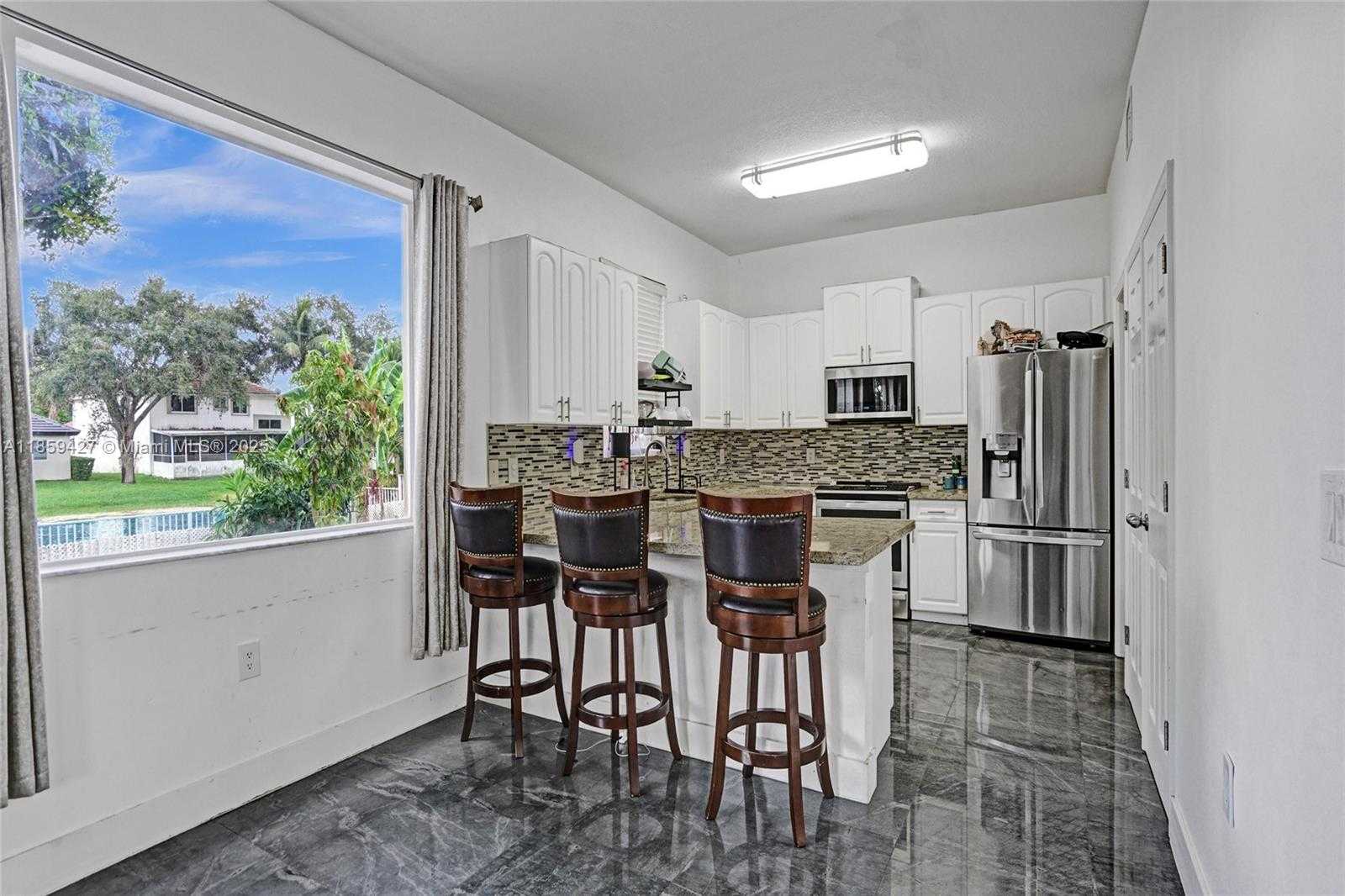 Small Image of 9860 NORTH WEST 20TH CT, Pembroke Pines Number 10