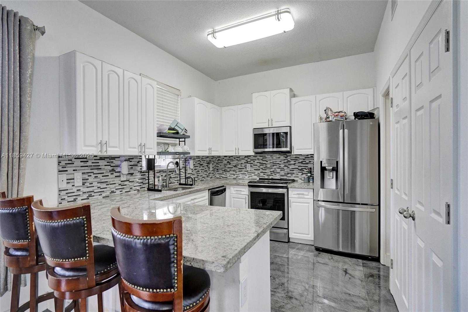 Small Image of 9860 NORTH WEST 20TH CT, Pembroke Pines Number 9