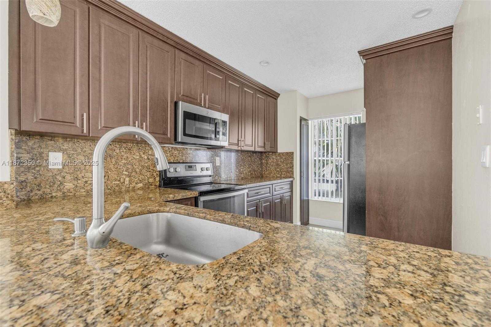 Small Image of 5904 WOODLAND POINT PL, Tamarac Number 12
