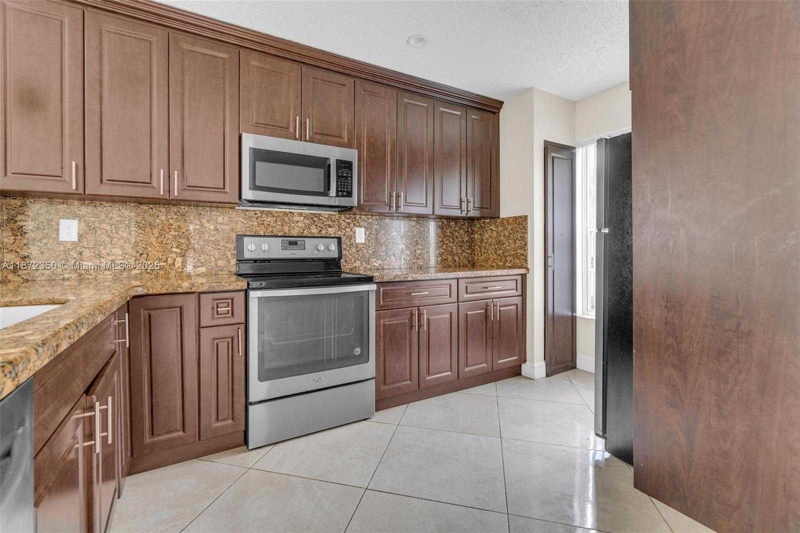 Small Image of 5904 WOODLAND POINT PL, Tamarac Number 7