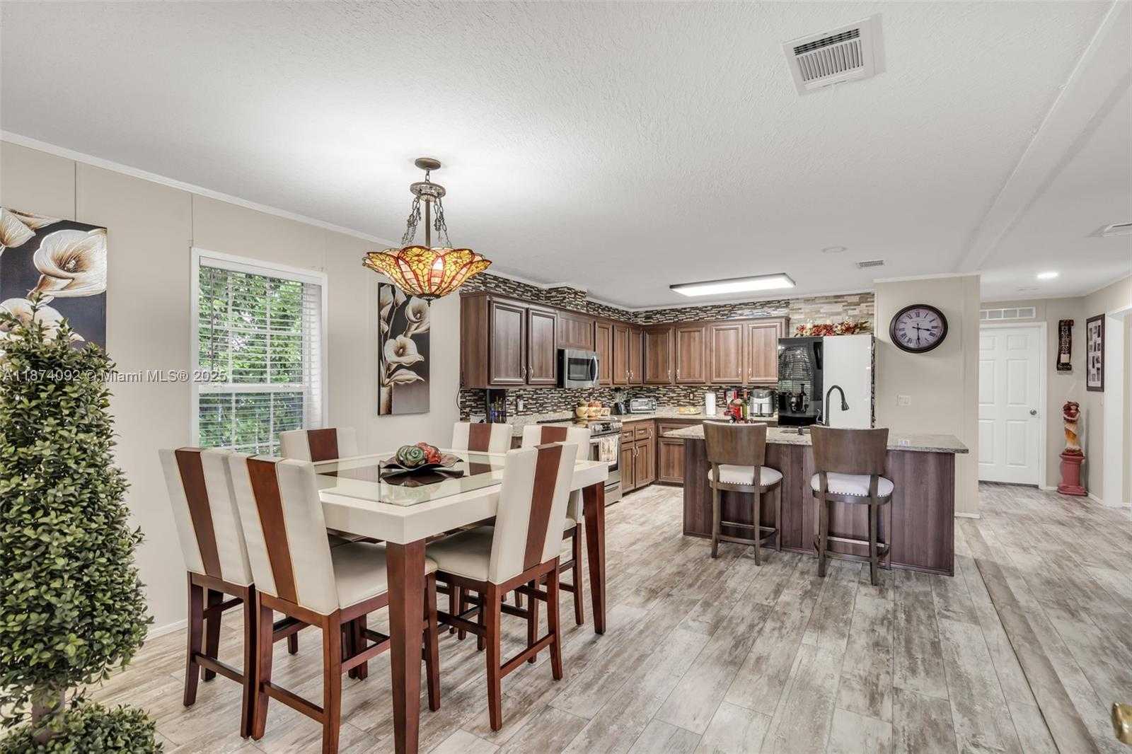 Small Image of 12850 WEST STATE RD #1 GARDENIA LN, Davie Number 2