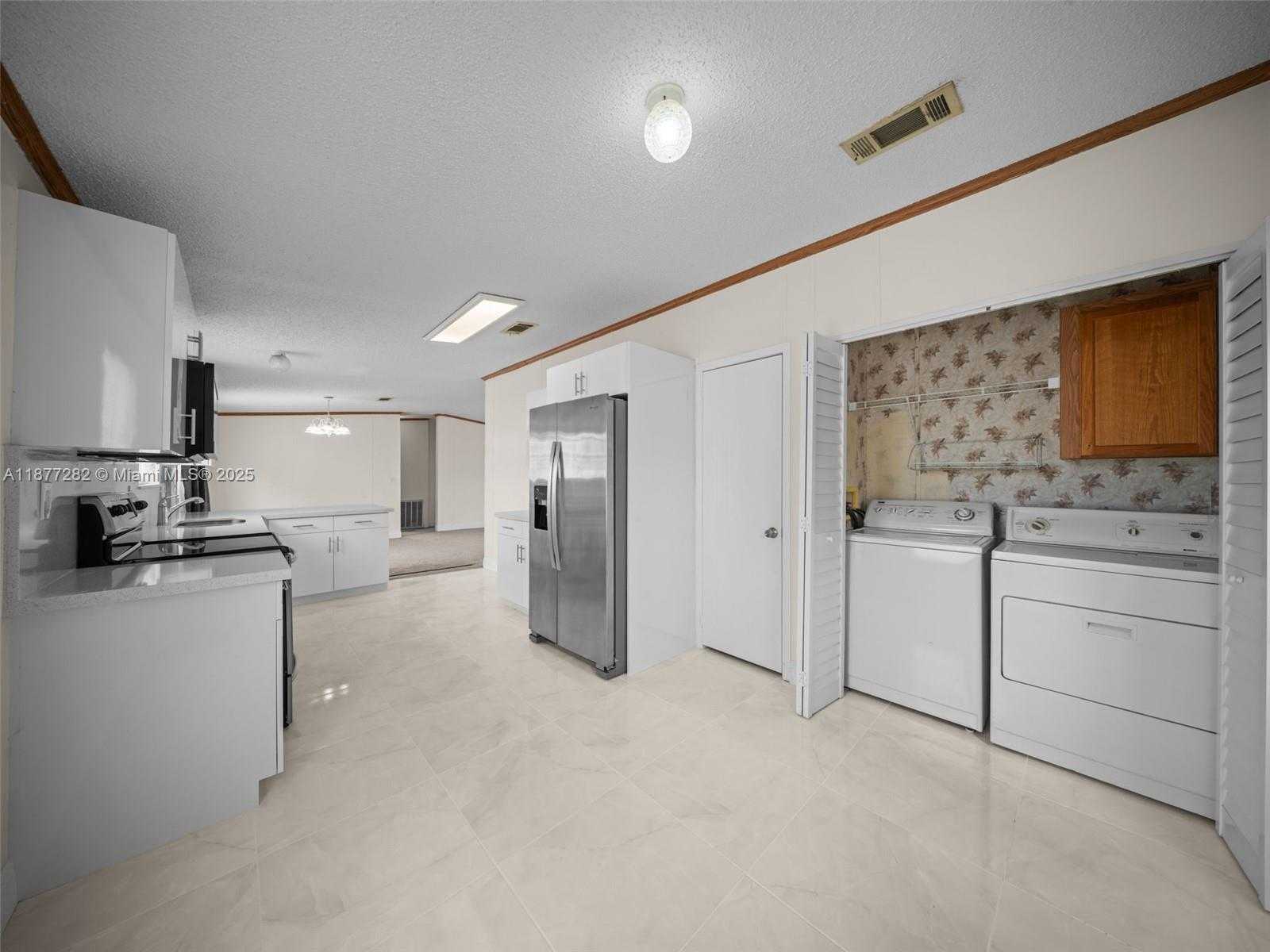 Small Image of 220 NORTH EAST 12TH AVE LOT 150, Homestead Number 13