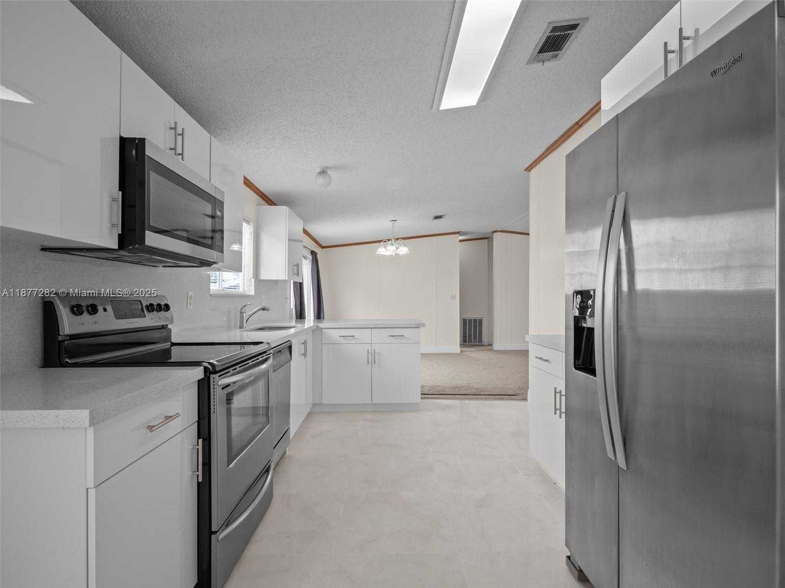 Small Image of 220 NORTH EAST 12TH AVE LOT 150, Homestead Number 14