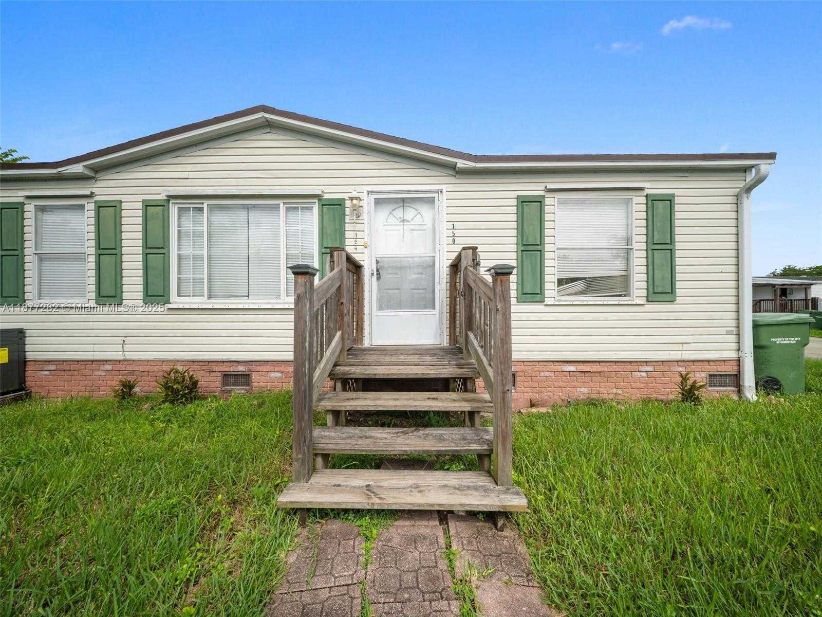 Small Image of 220 NORTH EAST 12TH AVE LOT 150, Homestead Number 2