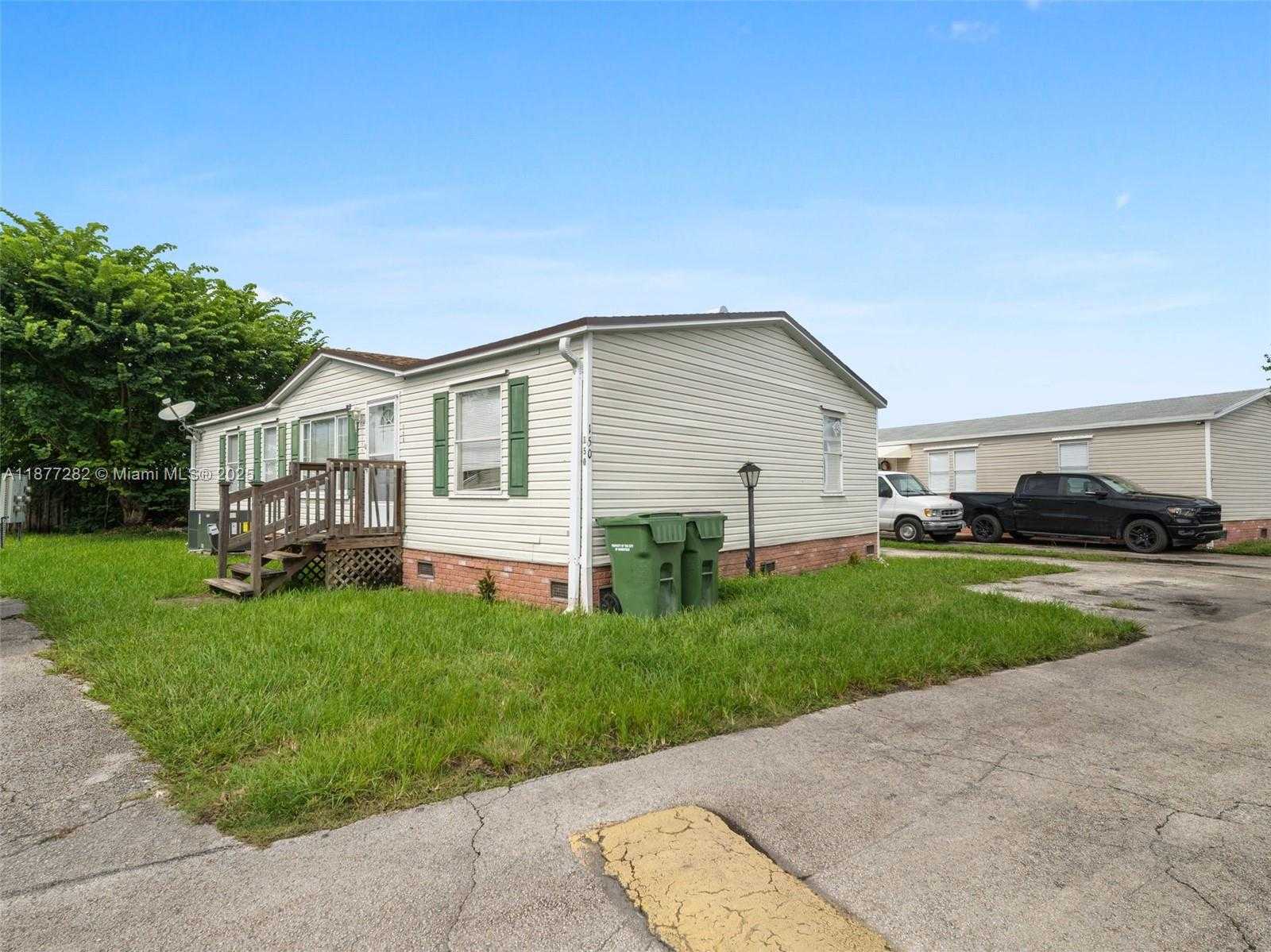 Small Image of 220 NORTH EAST 12TH AVE LOT 150, Homestead Number 4