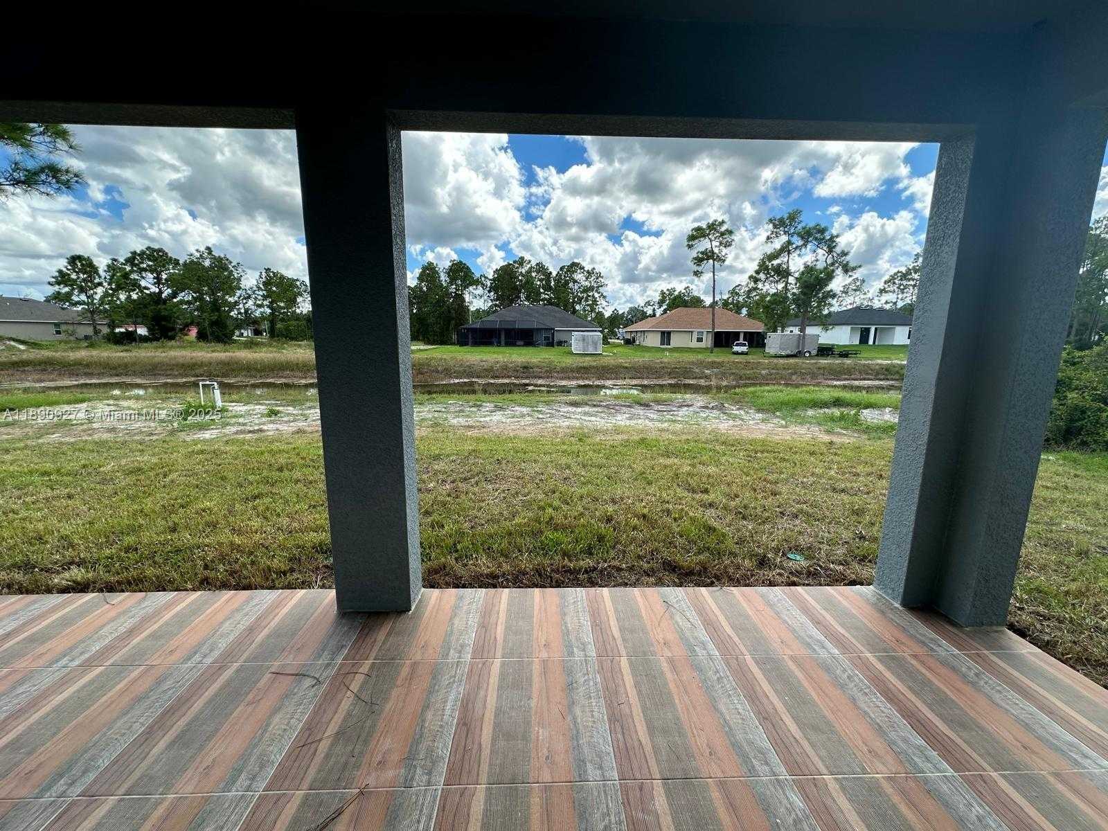 Small Image of 612 Ames St E, Lehigh Acres, FL 33974, USA Number 12