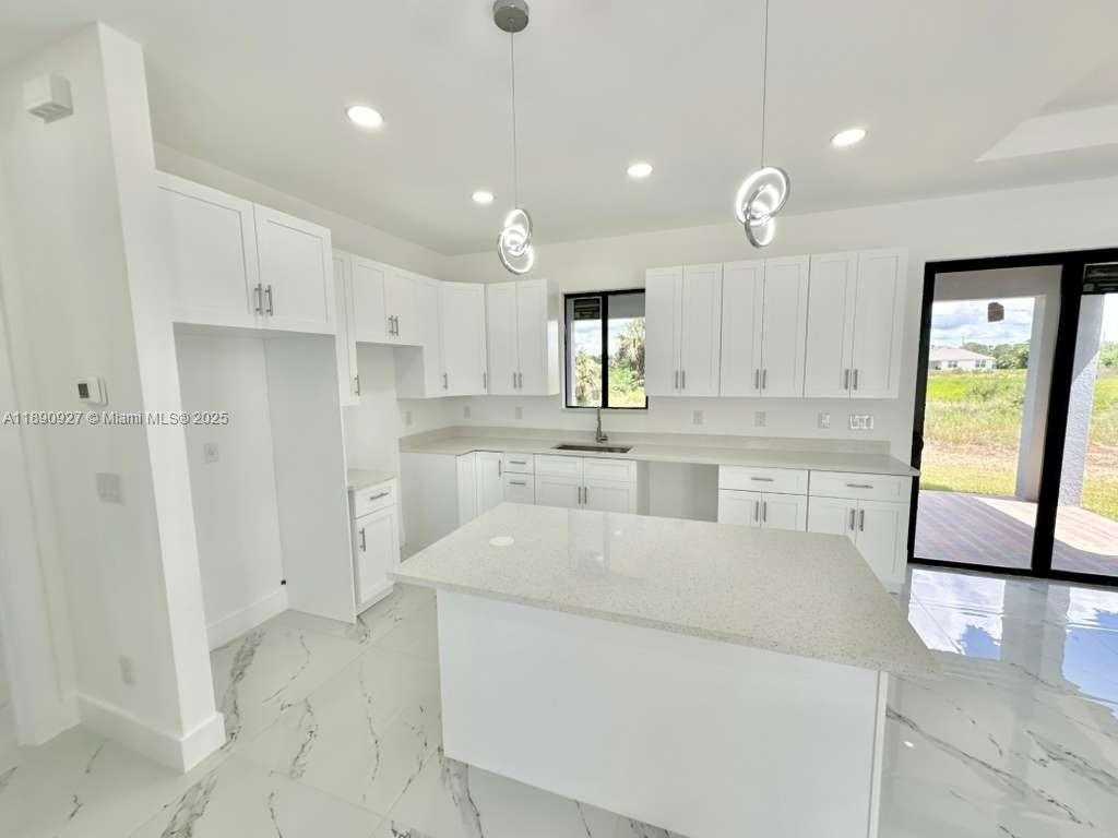 Small Image of 612 Ames St E, Lehigh Acres, FL 33974, USA Number 3