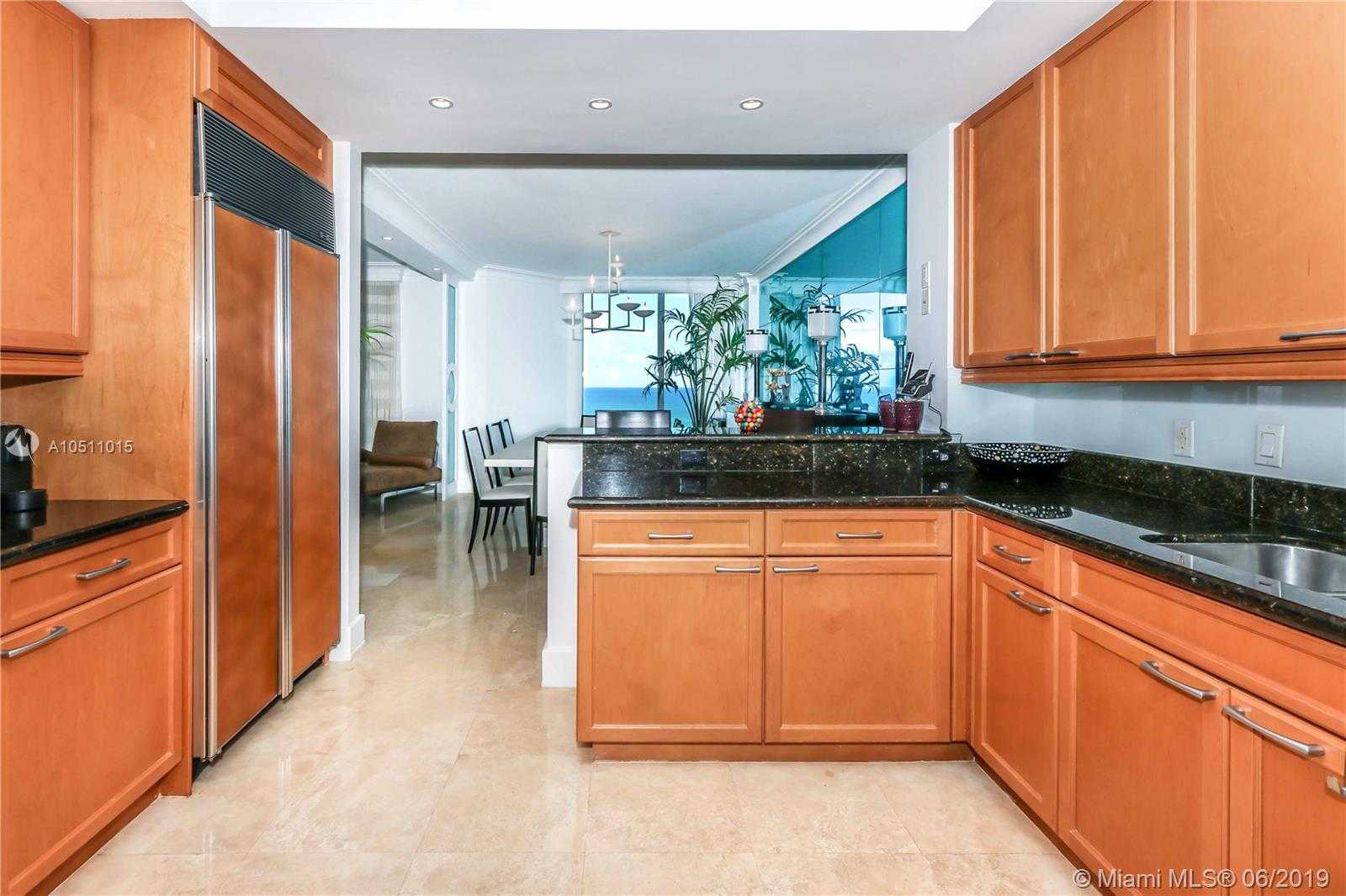 Small Image of 20201 E Country Club Dr, Miami, FL 33180, USA Number 20