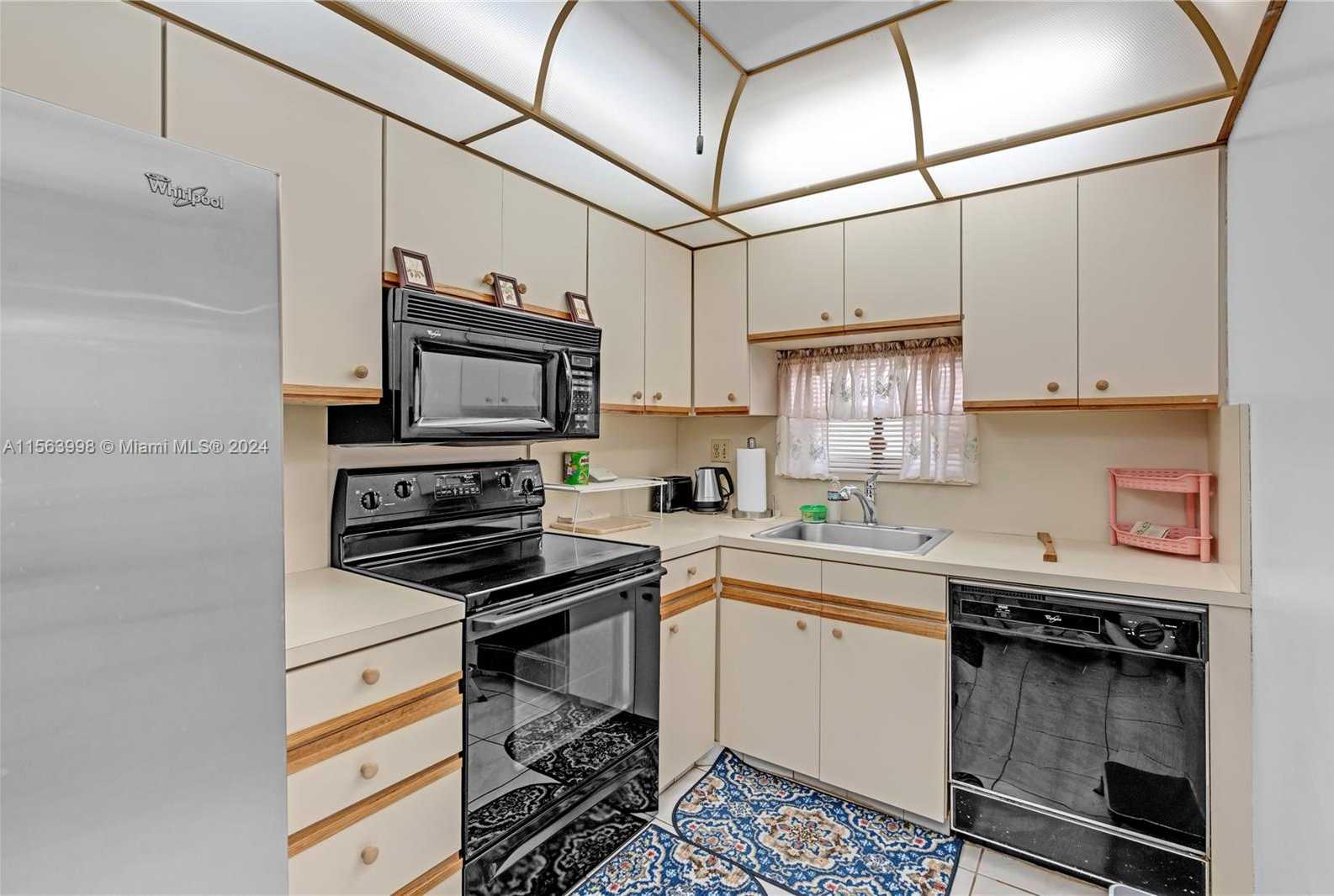 Small Image of 9800 NORTH HOLLYBROOK LAKE DR #202, Pembroke Pines Number 9