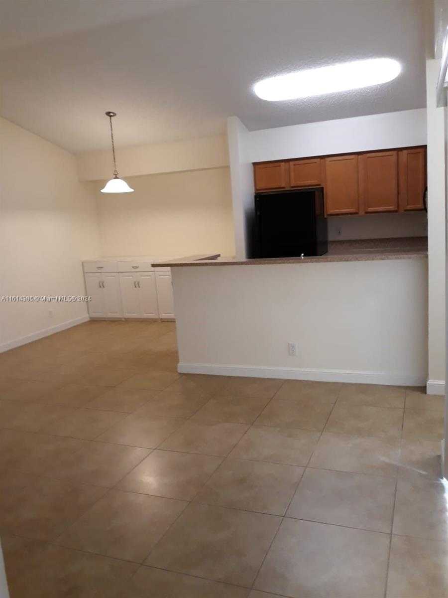 Small Image of 7630 WESTWOOD DR #324, Tamarac Number 7