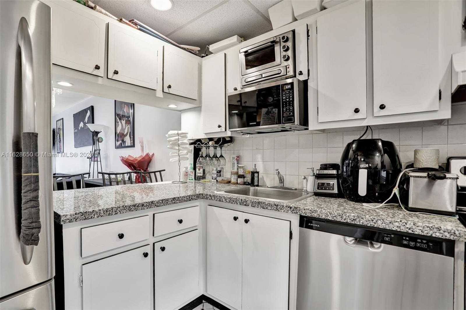 Small Image of 7897 GOLF CIR DR #107, Margate Number 12