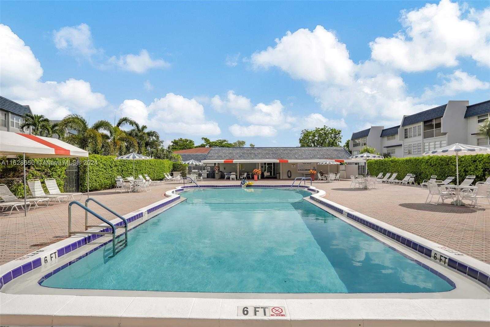 Small Image of 7897 GOLF CIR DR #107, Margate Number 4