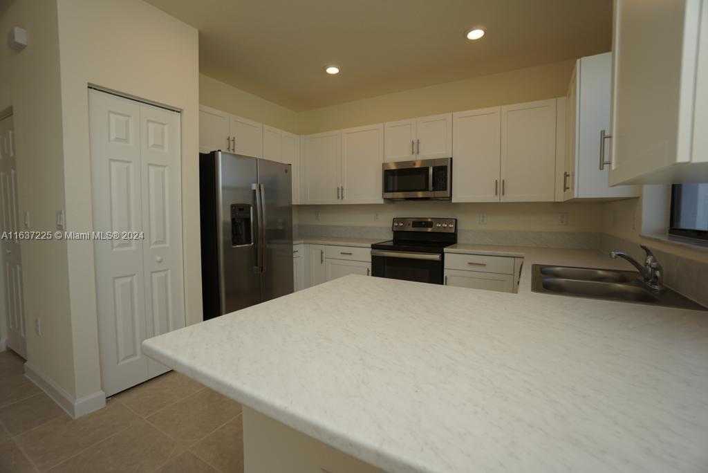 Small Image of 11011 WEST 33RD LN, Miami Lakes Number 3