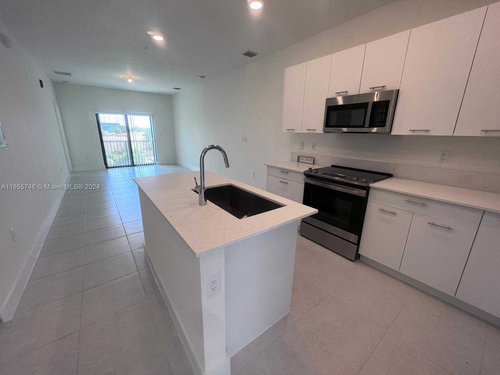 Small Image of 8001 NORTH WEST 41ST ST #F-310, Doral Number 2