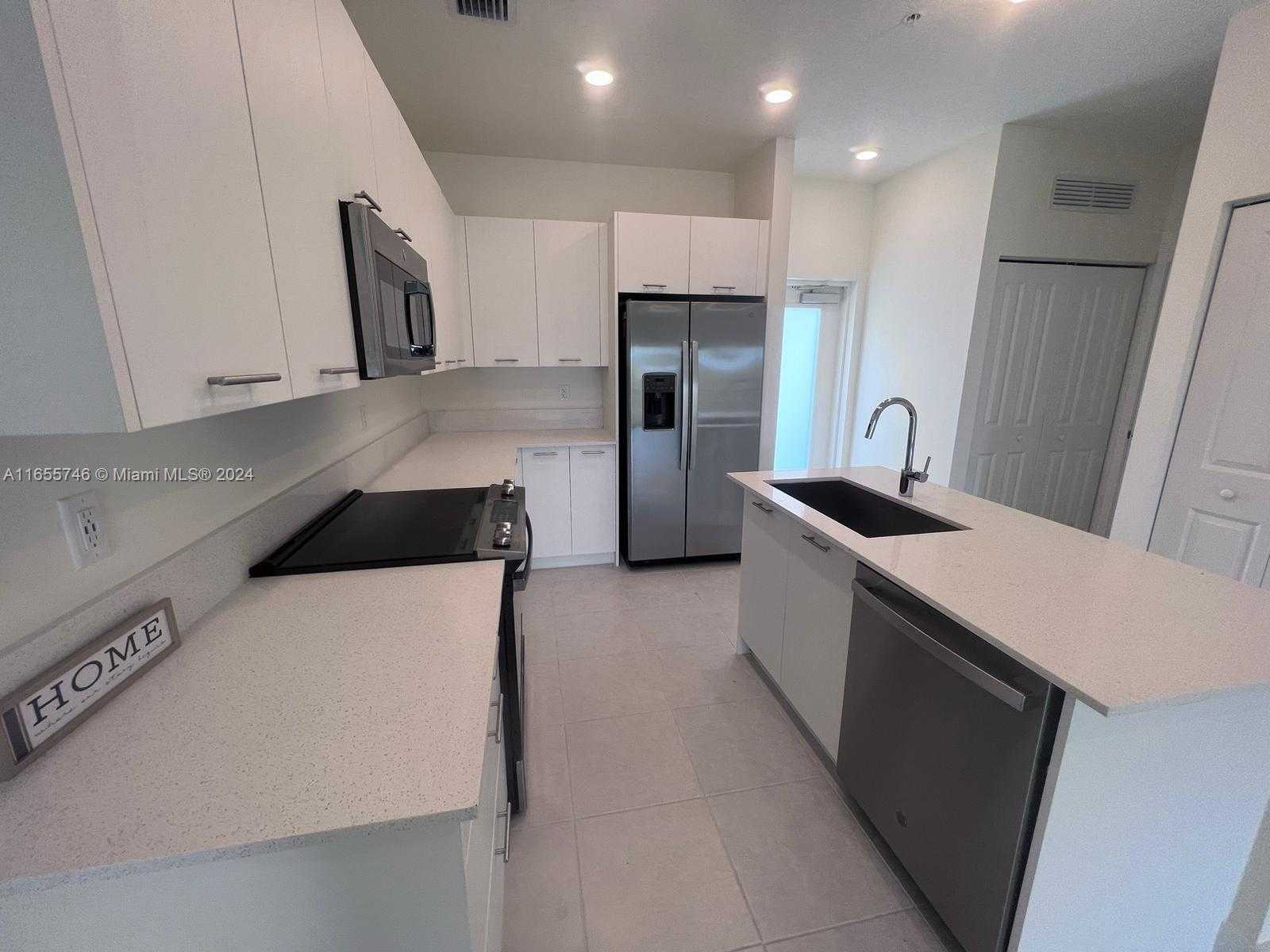 Small Image of 8001 NORTH WEST 41ST ST #F-310, Doral Number 3