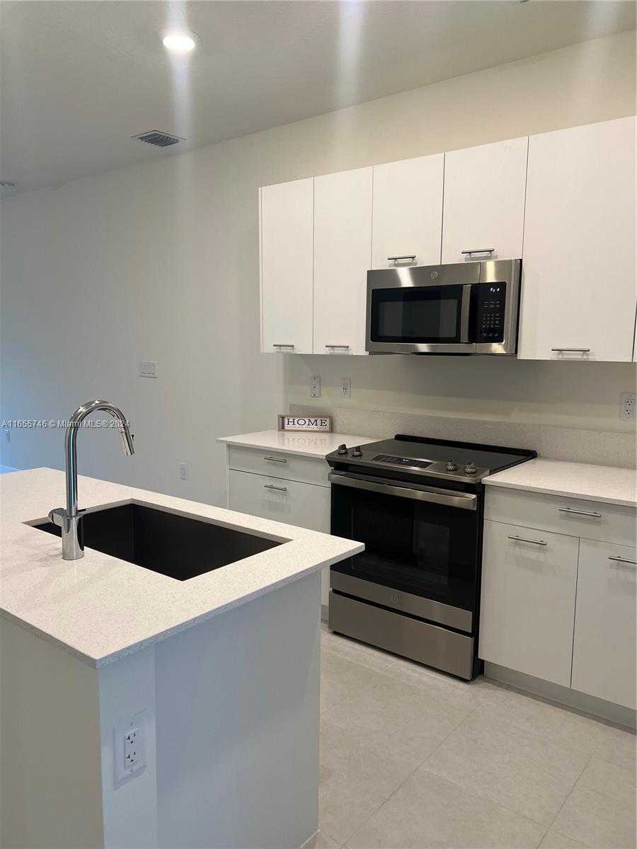 Small Image of 8001 NORTH WEST 41ST ST #F-310, Doral Number 4