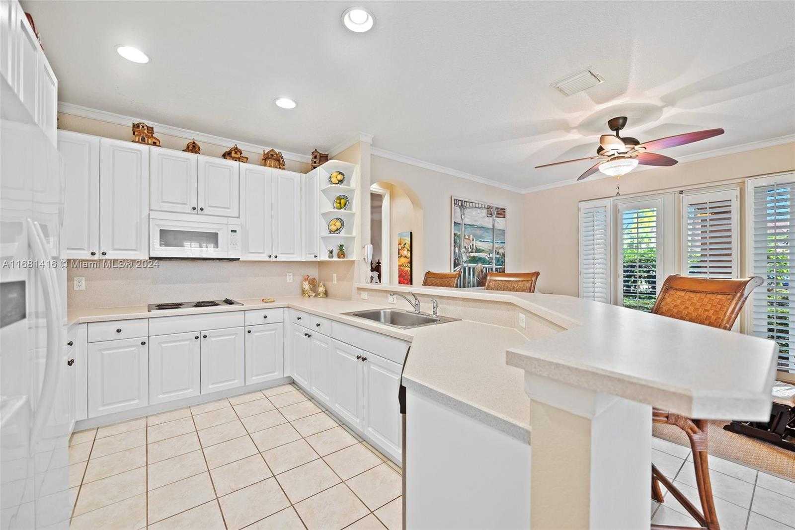 Small Image of 1634 PASSION VINE CIR #31-2, Weston Number 6