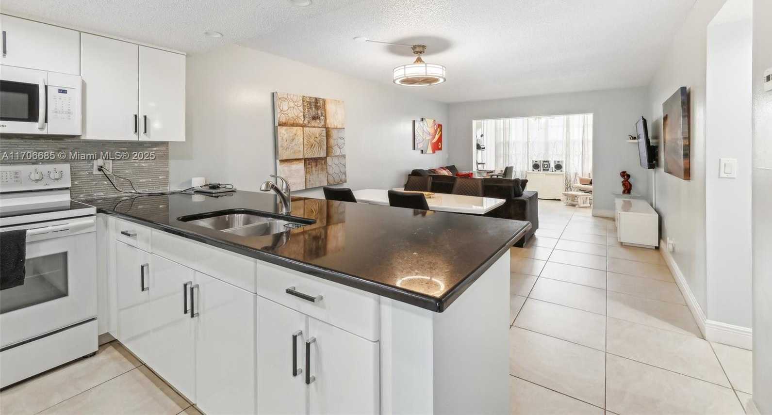 Small Image of 3170 HOLIDAY SPRINGS BLVD #6-108, Margate Number 12