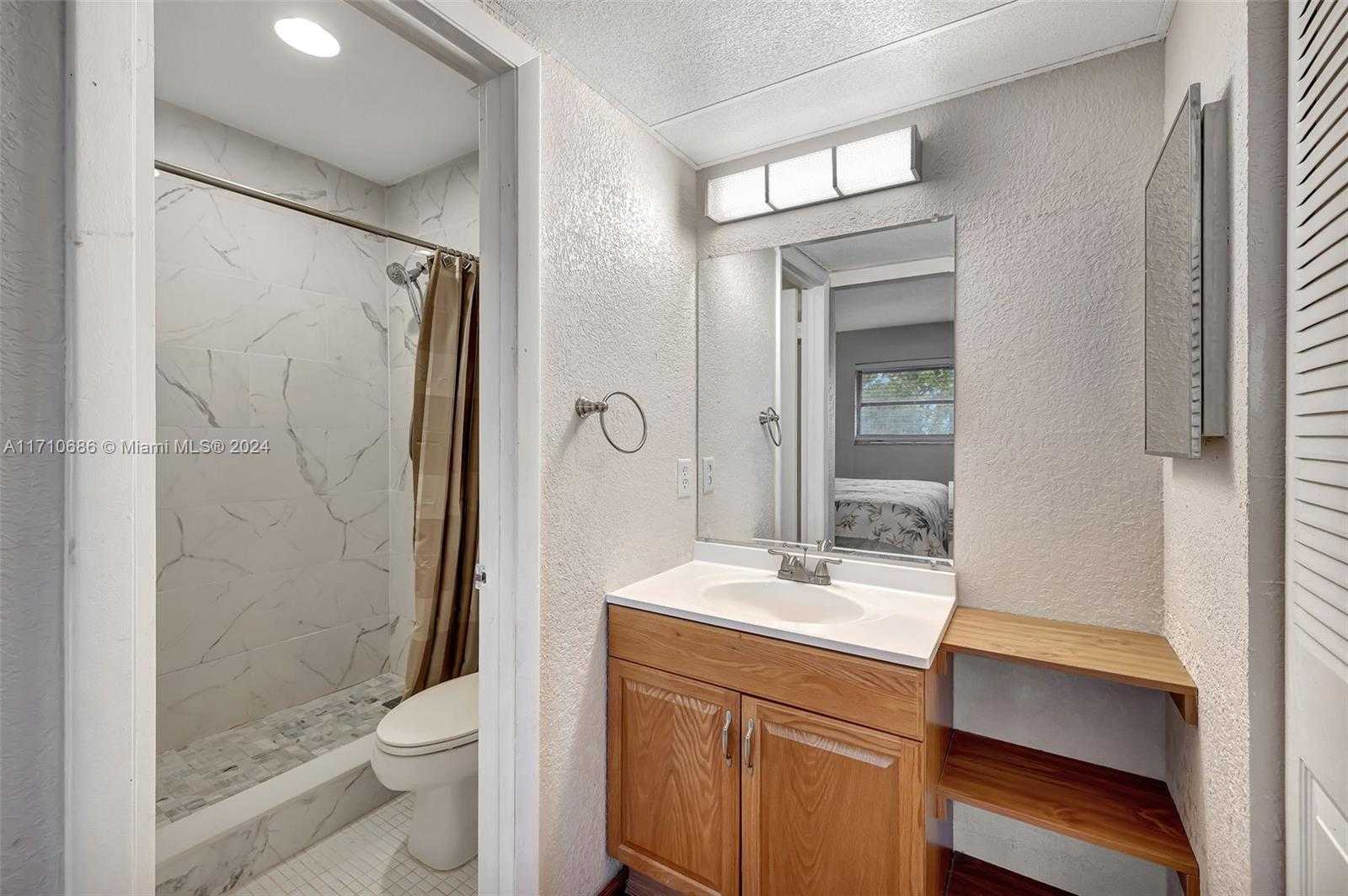 Small Image of 7897 GOLF CIR DR #309, Margate Number 19
