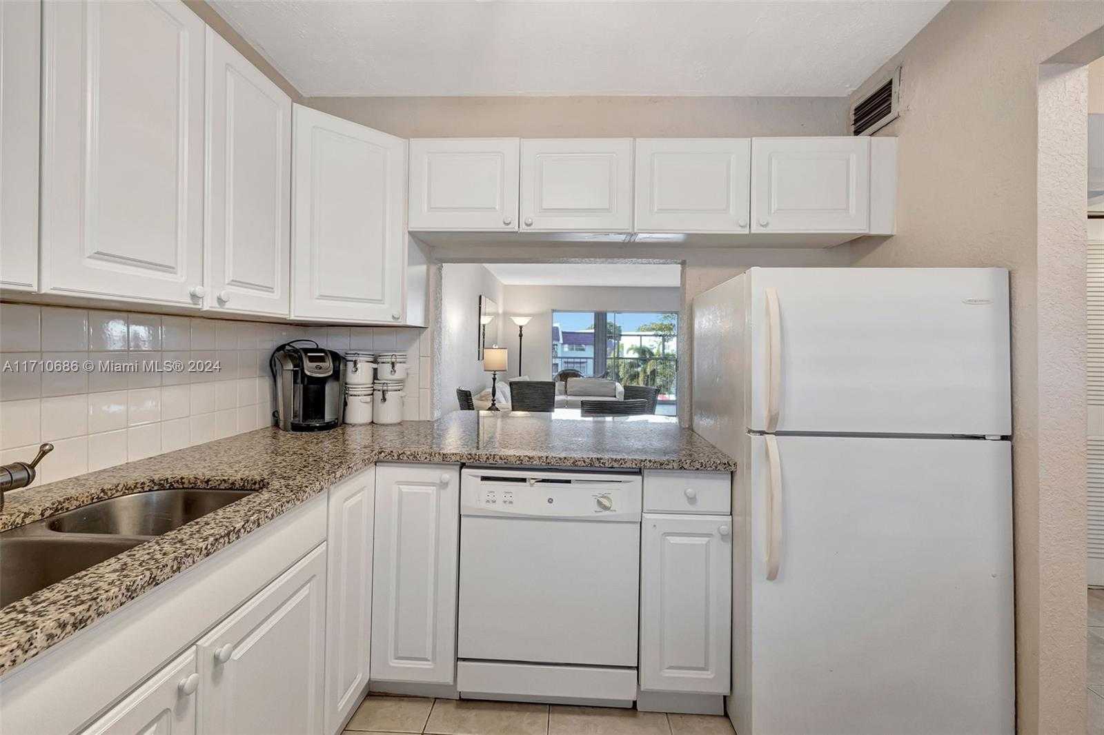 Small Image of 7897 GOLF CIR DR #309, Margate Number 2