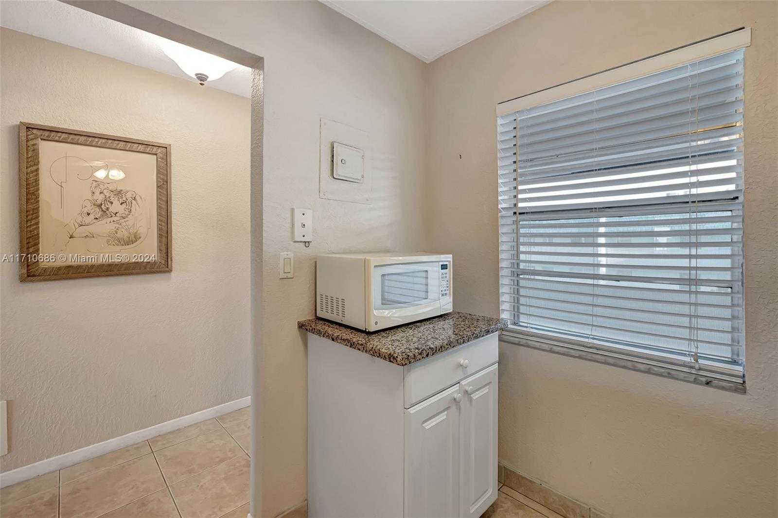 Small Image of 7897 GOLF CIR DR #309, Margate Number 3