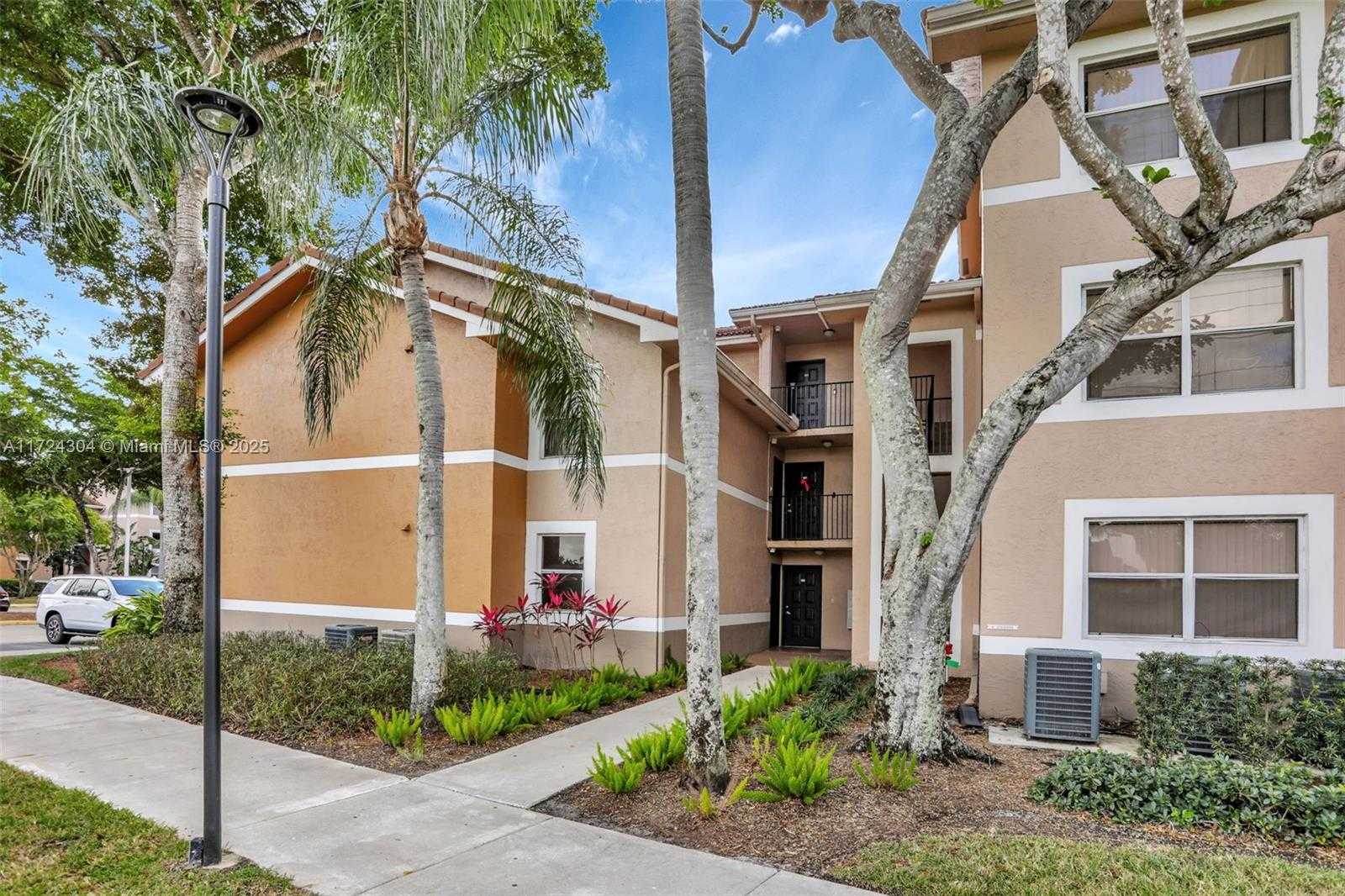 Small Image of 8891 Wiles Rd, Coral Springs, FL 33067, USA Number 2