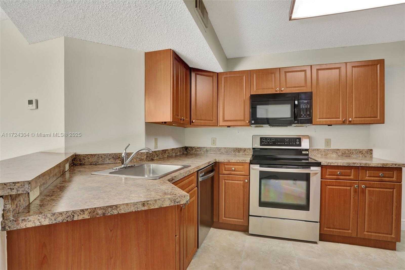 Small Image of 8891 Wiles Rd, Coral Springs, FL 33067, USA Number 4