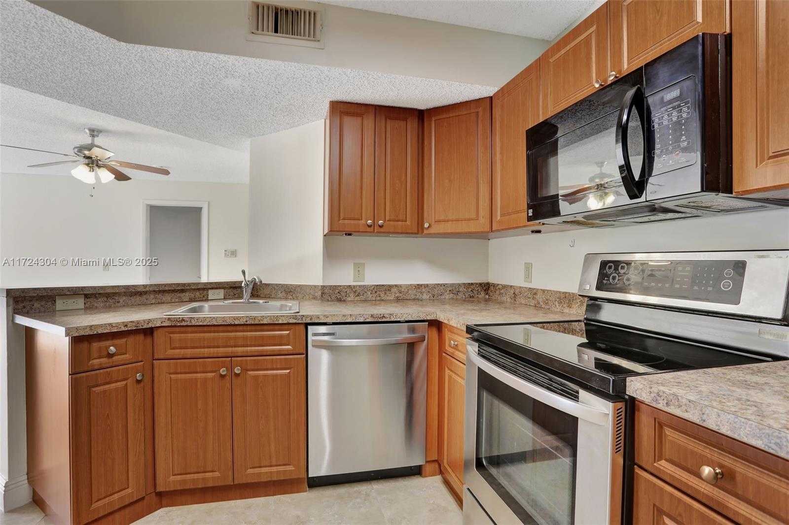 Small Image of 8891 Wiles Rd, Coral Springs, FL 33067, USA Number 5