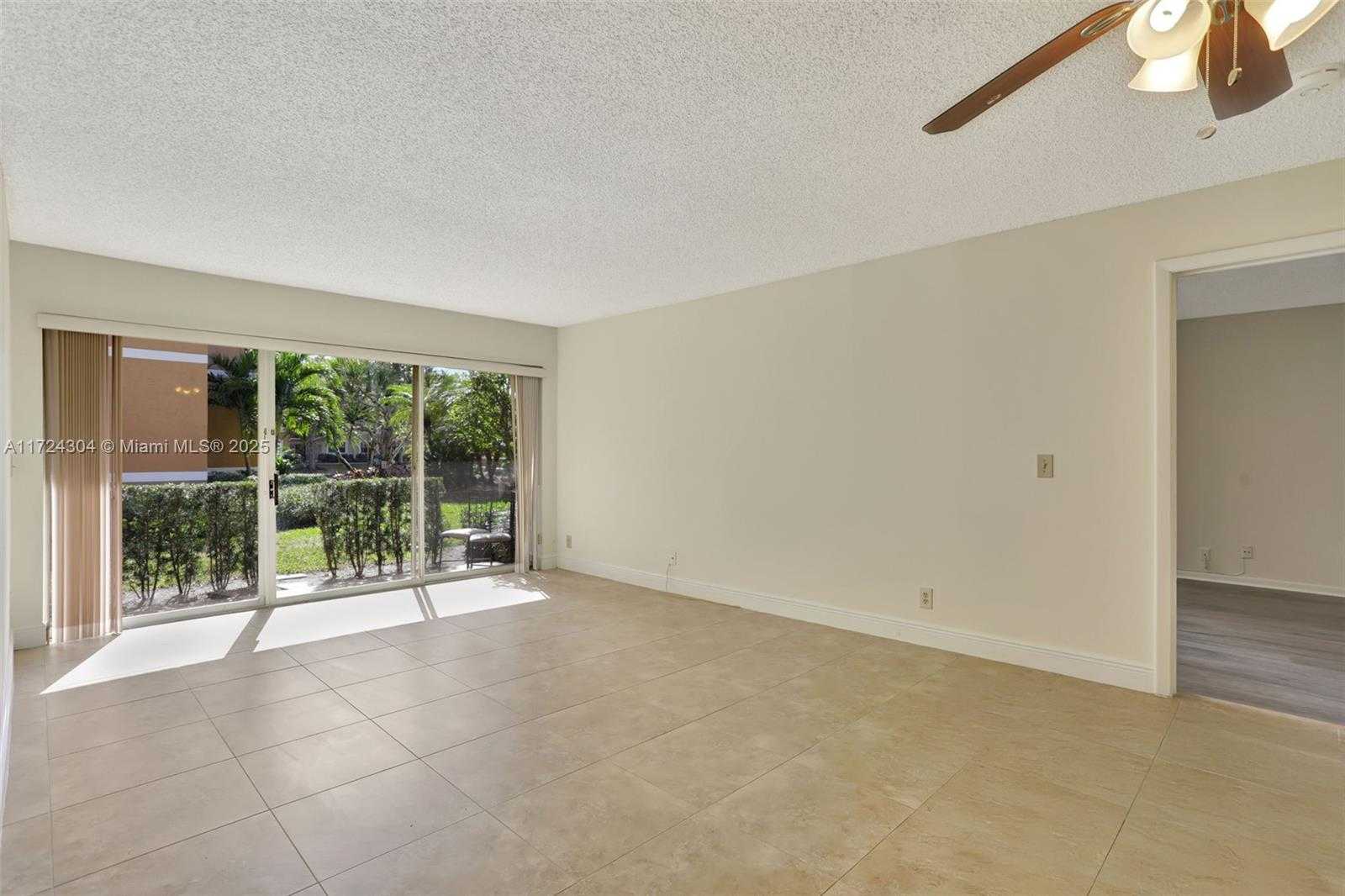 Small Image of 8891 Wiles Rd, Coral Springs, FL 33067, USA Number 6