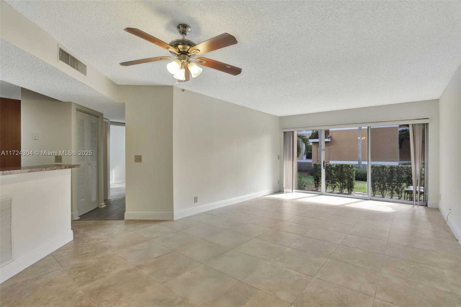 Small Image of 8891 Wiles Rd, Coral Springs, FL 33067, USA Number 7