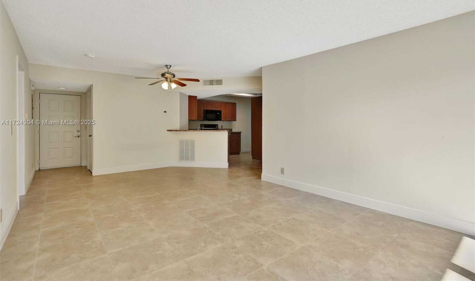 Small Image of 8891 Wiles Rd, Coral Springs, FL 33067, USA Number 8