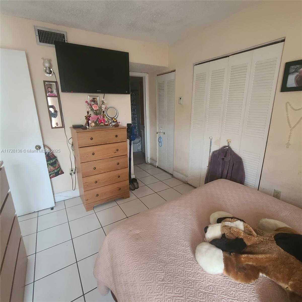 Small Image of 4803 NORTH WEST 7TH ST #103-14, Miami Number 9