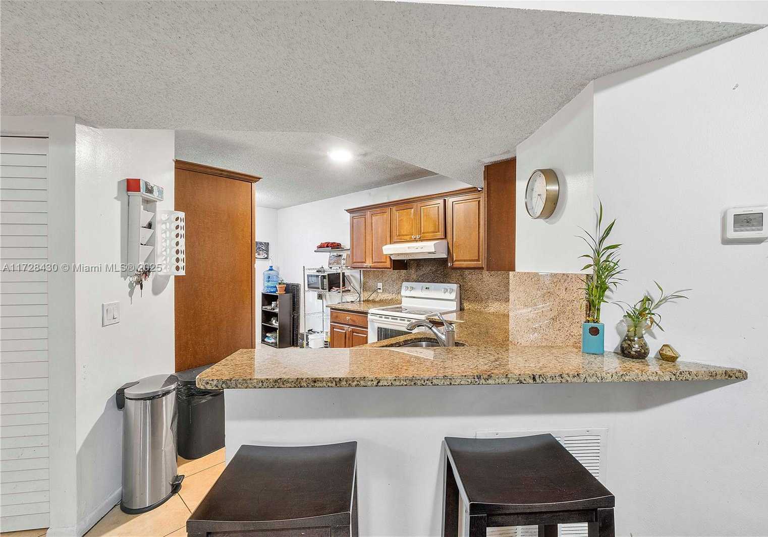 Small Image of 8761 WILES RD #206, Coral Springs Number 8