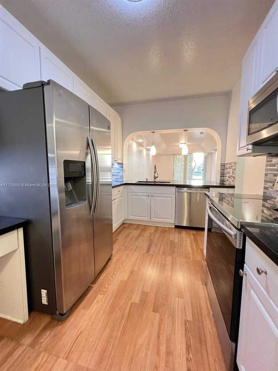 Small Image of 10710 NORTH WEST 66TH ST #111, Doral Number 6