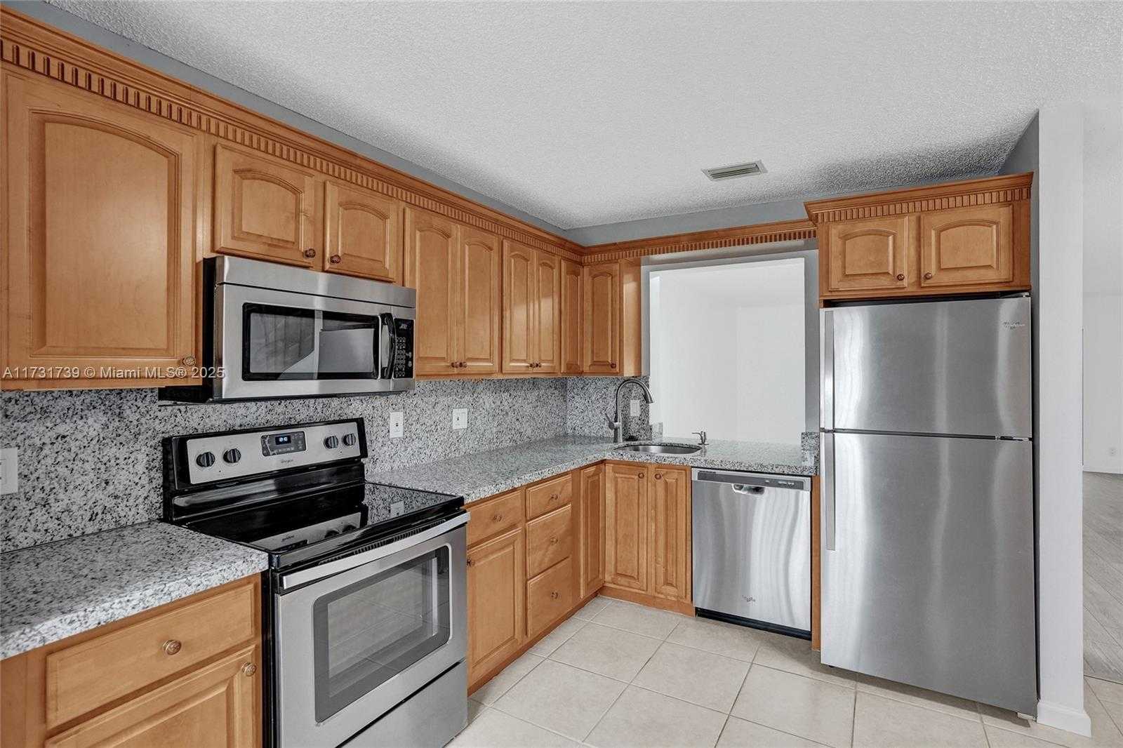 Small Image of 2641 Gately Dr W, West Palm Beach, FL 33415, USA Number 5