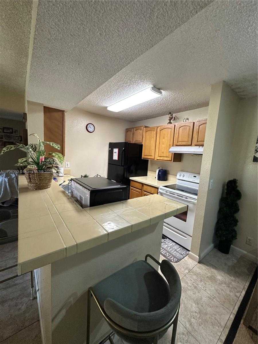 Small Image of 4025 WEST MCNAB RD #E208, Pompano Beach Number 2