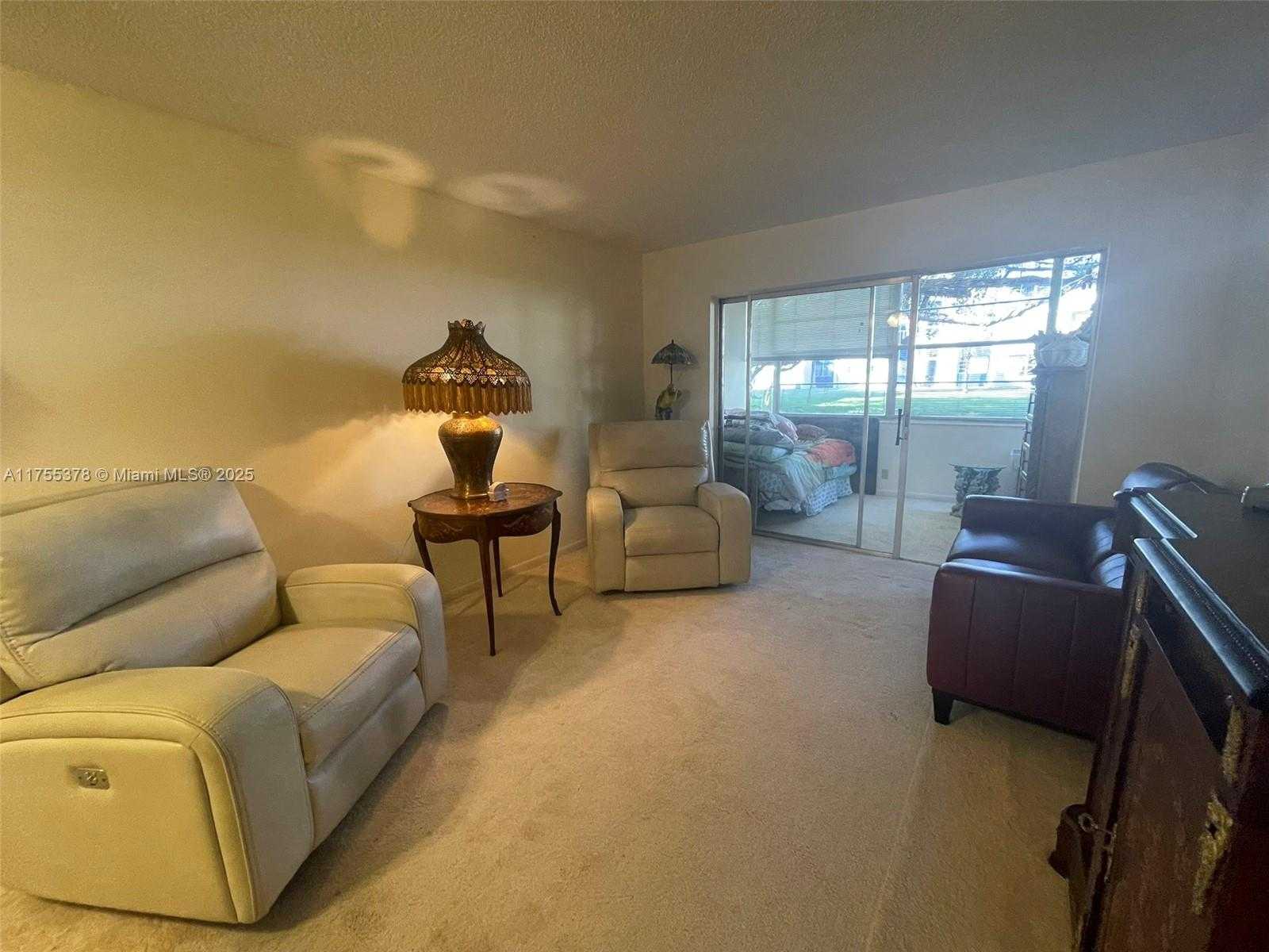 Small Image of 3180 HOLIDAY SPRINGS BLVD #5-107, Margate Number 2
