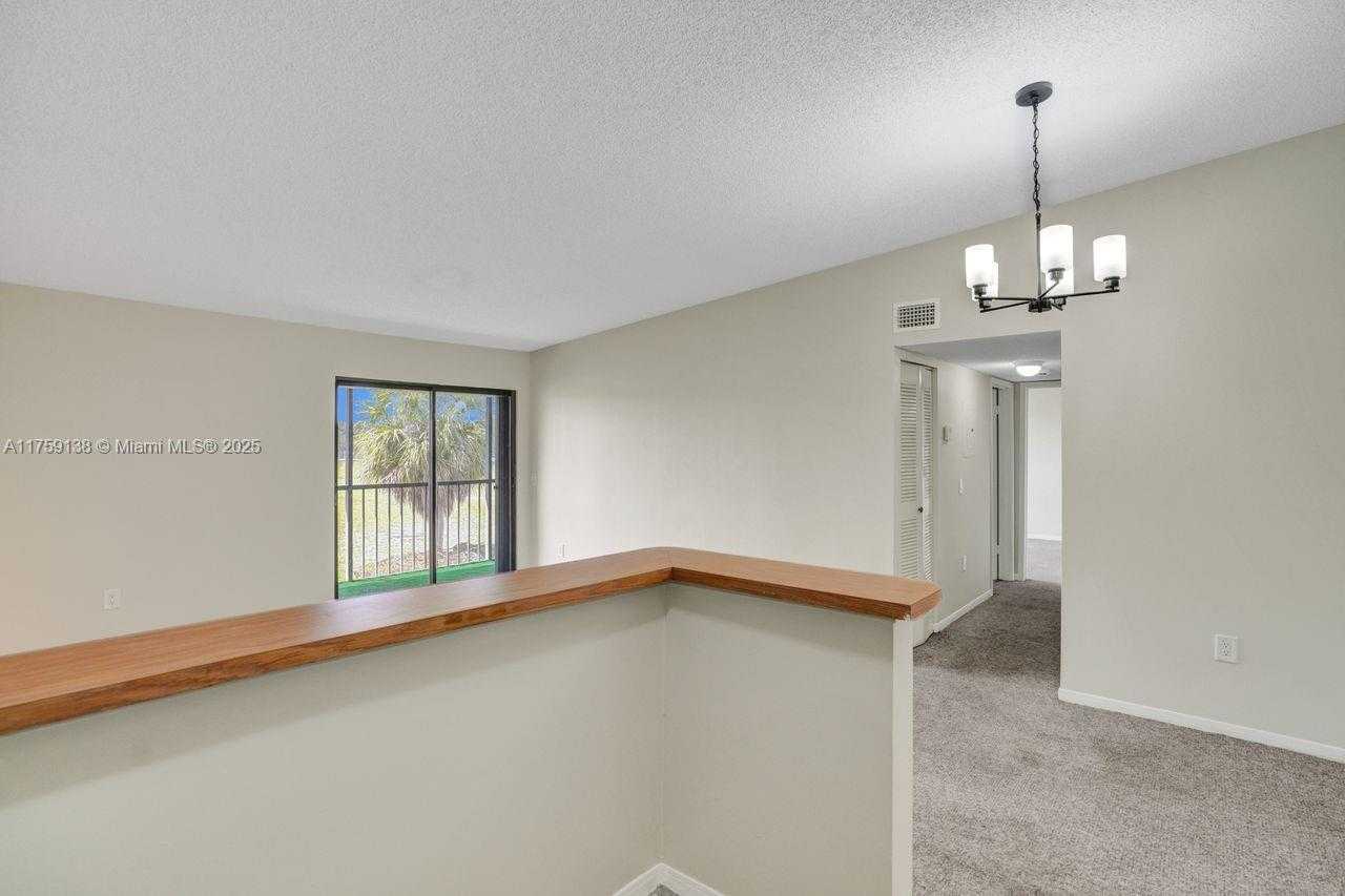Small Image of 9731 HAMMOCKS BLVD #203B, Miami Number 5