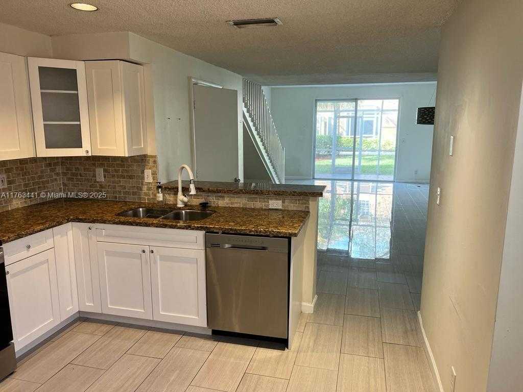 Small Image of 1597 BARCELONA WAY #2-32, Weston Number 5