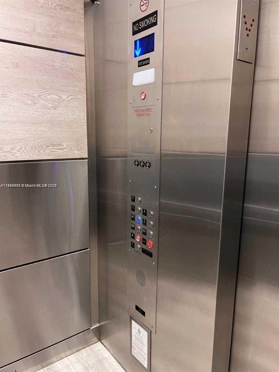 Small Image of 8343 LAKE DR #207, Doral Number 2