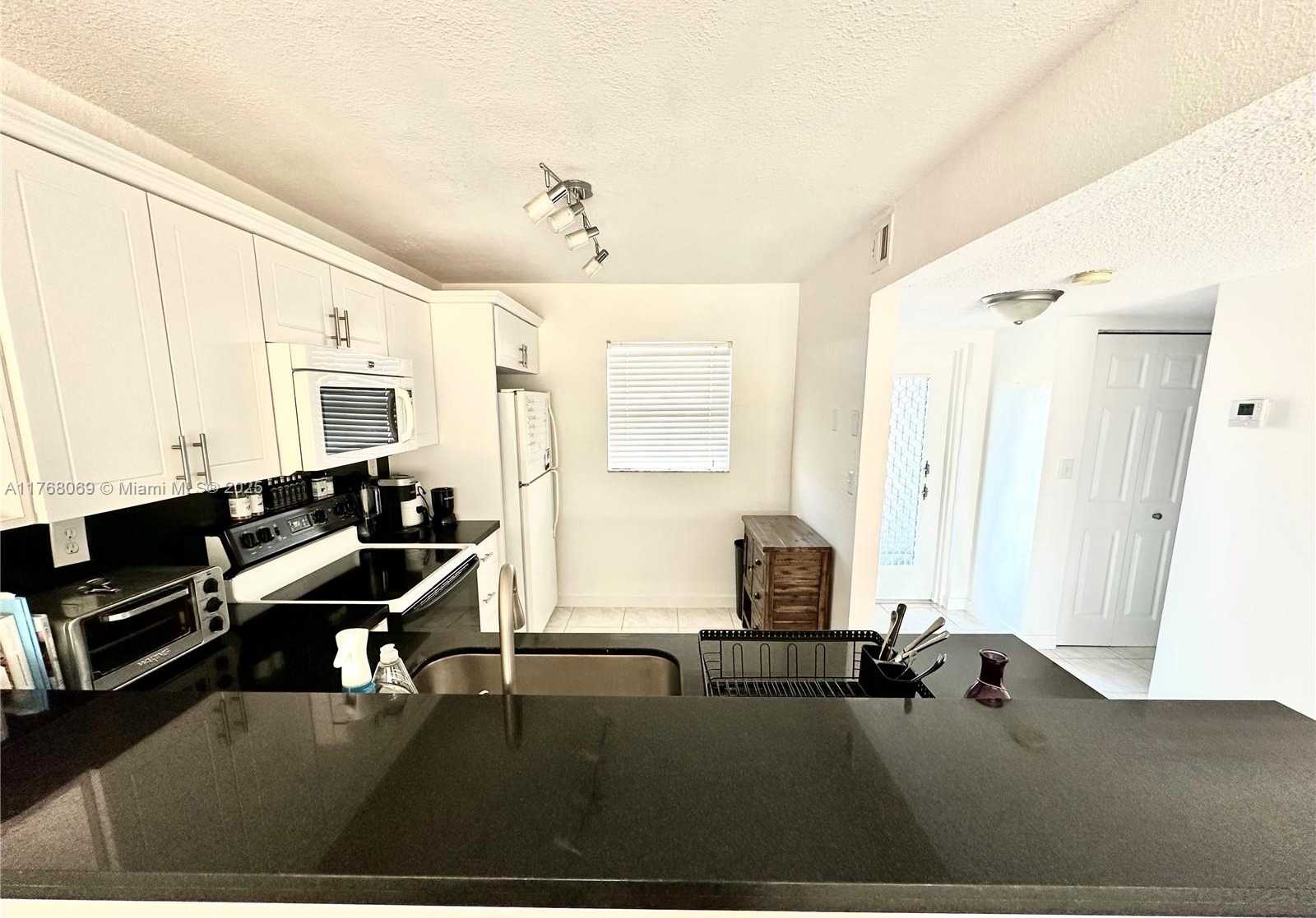 Small Image of 8300 SANDS POINT BLVD #K306, Tamarac Number 18