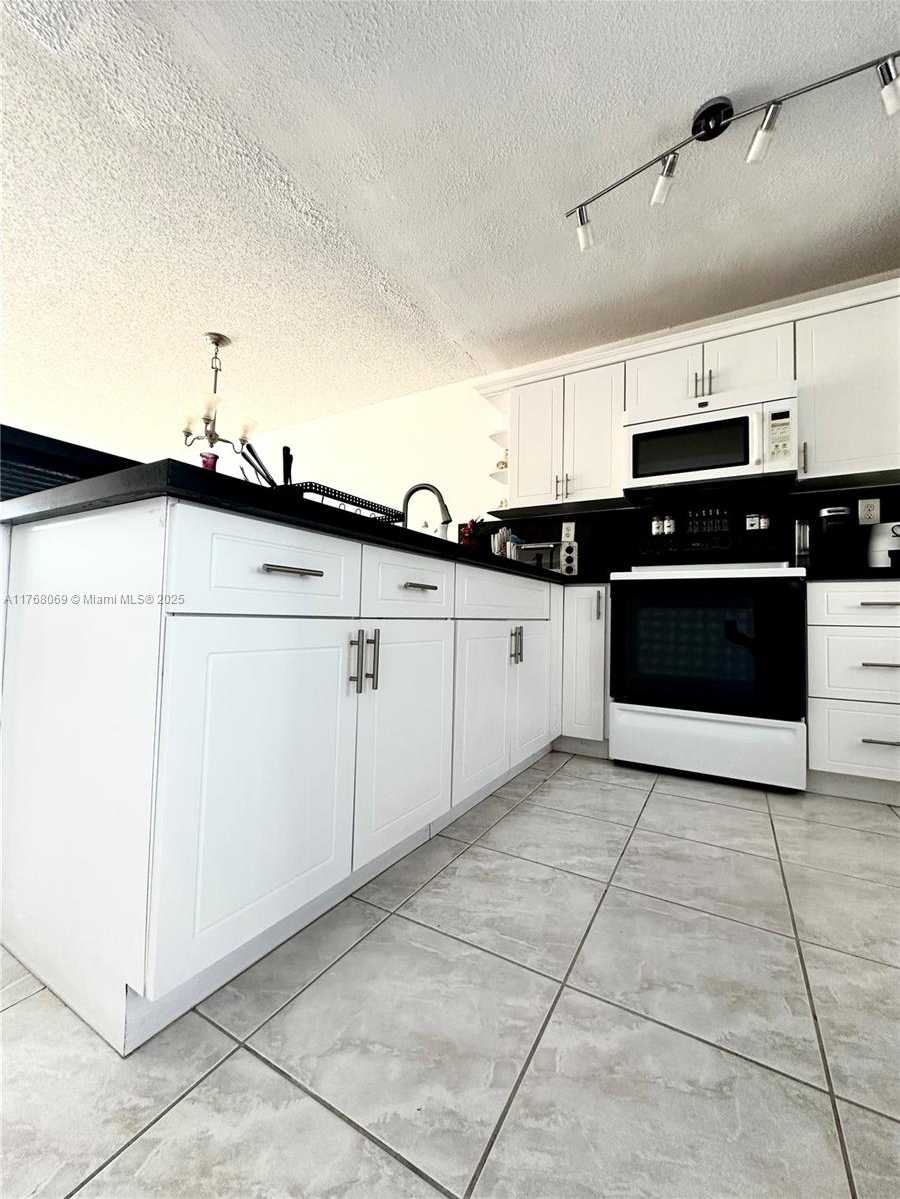 Small Image of 8300 SANDS POINT BLVD #K306, Tamarac Number 7