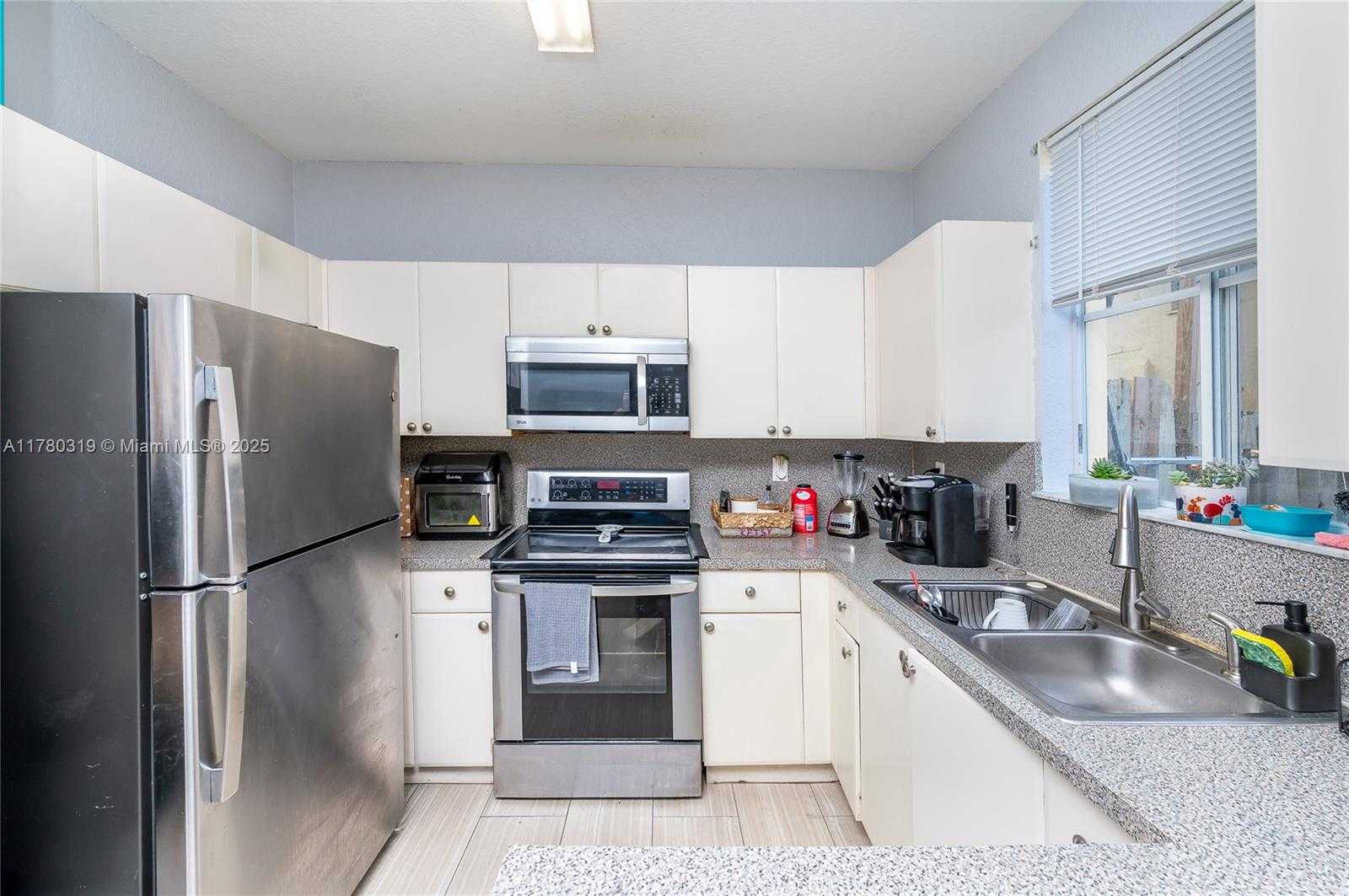 Small Image of 6940 NORTH WEST 177TH ST #103, Hialeah Number 2