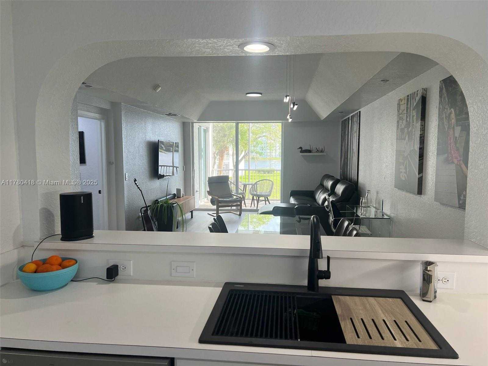Small Image of 10770 NORTH WEST 66TH ST #203, Doral Number 10