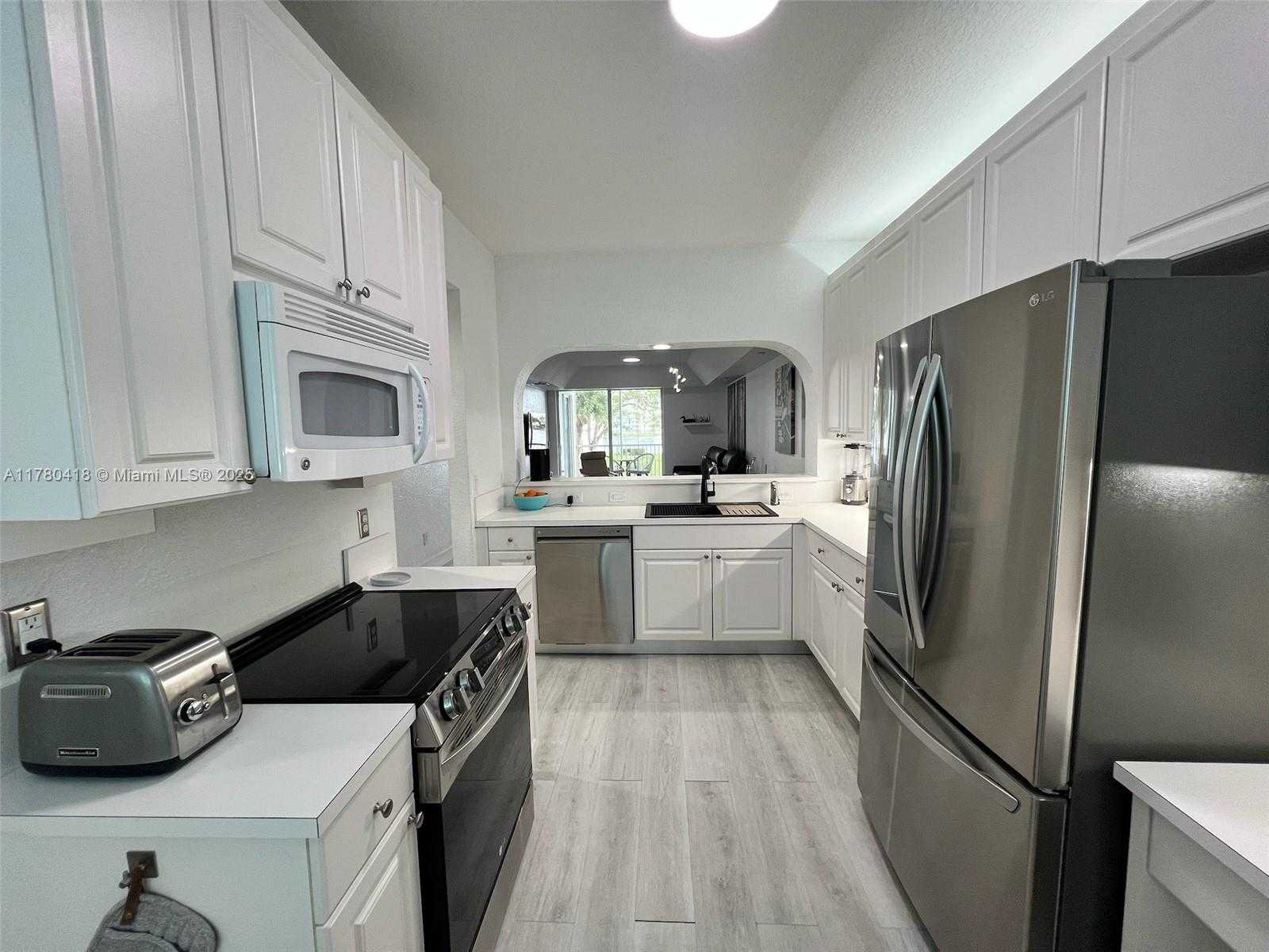 Small Image of 10770 NORTH WEST 66TH ST #203, Doral Number 11